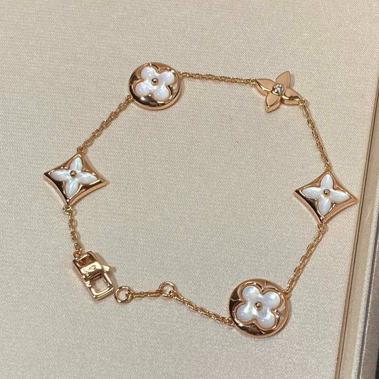 [Echo ]STAR AND SUN 5 MOTIF MOP PINK GOLD BRACELET